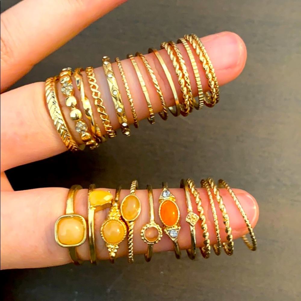 Set of 25 various fashion rings. Gold size 7